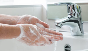 Wash hands with soap and water to prevent the spread of viruses