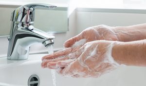 wash hands with soap and water to prevent the spread of viruses